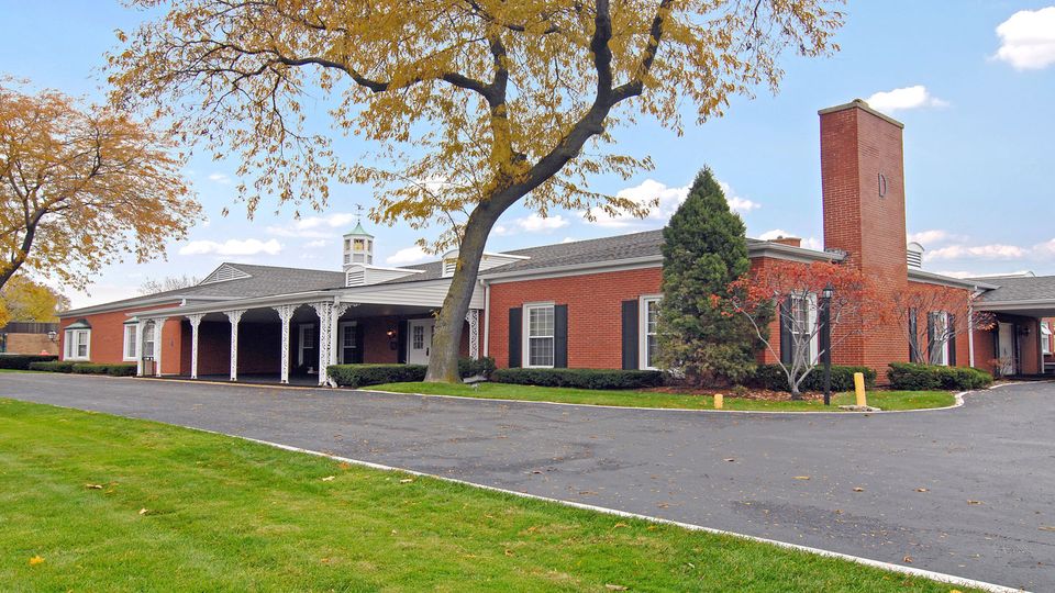 An exterior view of Drake and Son Funeral Home in Chicago on a warm autumn day
